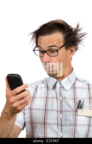 Nerdy looking man makes a weird and surprised facial expression while viewing his smartphone. Stock Photo