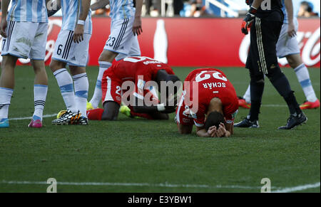 Sao Paulo, Brazil. 1st July, 2014. Switzerland's Fabian Schaer (front) reacts after missing the last chance during a Round of 16 match between Argentina and Switzerland of 2014 FIFA World Cup at the Arena de Sao Paulo Stadium in Sao Paulo, Brazil, on July 1, 2014. Argentina won 1-0 over Switzerland after 120 minutes and qualified for quarter-finals on Tuesday. Credit:  Wang Lili/Xinhua/Alamy Live News Stock Photo
