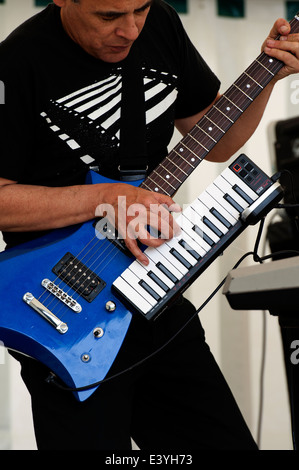 guitar with keyboard attached