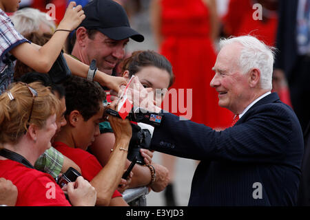 Ottawa, Canada. 1st July, 2014. Canada's Governor General David Johnston (R) greets the crowd during the ceremonies to celebrate the 147th Canada Day on Parliament Hill in Ottawa, Canada, on July 1, 2014. Credit:  David Kawai/Xinhua/Alamy Live News Stock Photo