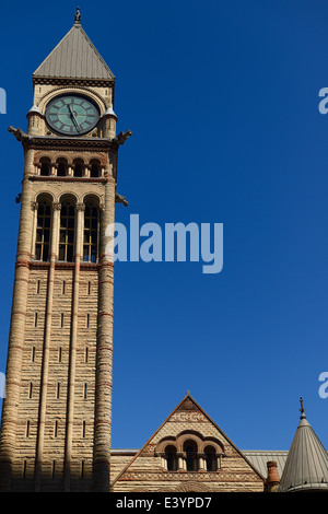 Clock tower of Toronto Old City Hall heritage landmark building with clear blue sky Stock Photo