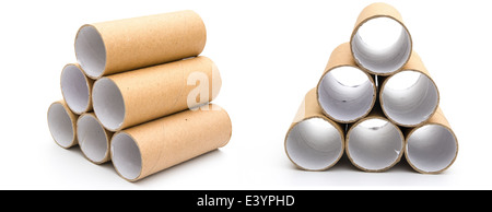 empty toilet rolls stack up on white Stock Photo