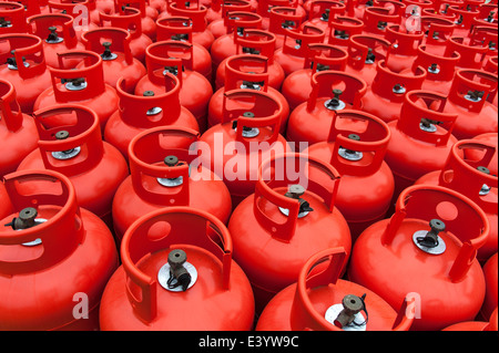 Close up of hundreds of gas bottles waiting in a storage depot. Stock Photo
