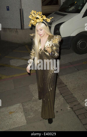 Lady Gaga leaves ITV studios after filming Chatty Man with Alan Carr wearing a golden outfit  Featuring: Lady Gaga Where: London, United Kingdom When: 04 Dec 2013 Stock Photo