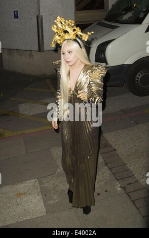 Lady Gaga leaves ITV studios after filming Chatty Man with Alan Carr wearing a golden outfit  Featuring: Lady Gaga Where: London, United Kingdom When: 04 Dec 2013 Stock Photo