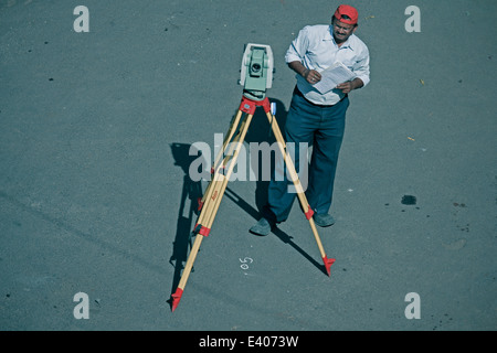 Surveying measuring equipment level transit theodolite on tripod Stock Photo