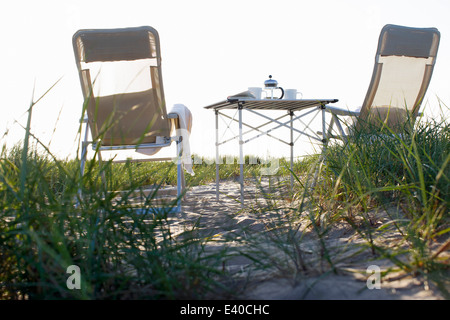 A picnic setting on the beach Stock Photo