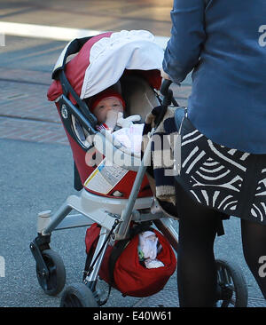 Cougar Town actress Busy Philipps takes daughter’s Birdie and baby Cricket to The Grove shopping Mall in West Hollywood  Featuring: Birdie Leigh Silverstein,Busy Phillips,Cricket Pearl Silverstein Where: Los Angeles, California, United States When: 11 Dec Stock Photo