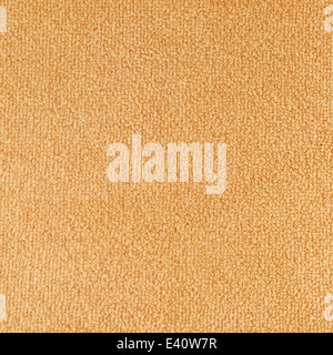 New carpet texture. Bright Beige carpet flooring as seamless background. Stock Photo