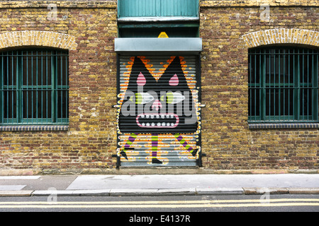 England, London, Shoreditch, Christina Street, graffito of Malarky on shutter Stock Photo