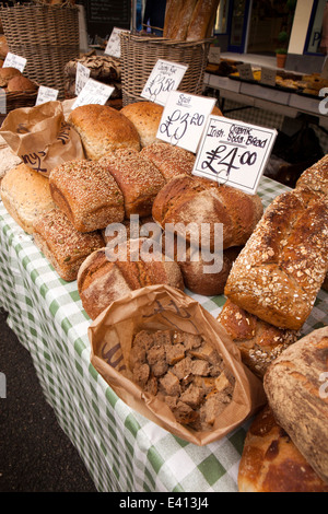 UK England, Suffolk, Bury St Edmunds, market stall selling freshly baked loaves of bread Stock Photo