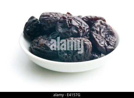 pitted prunes on white background Stock Photo