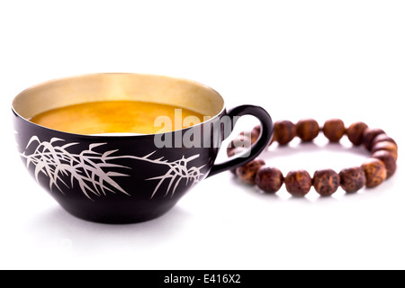 Tea cup & Bracelet Stock Photo