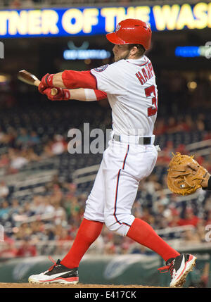 Washington Nationals' Bryce Harper, left, watches his two-run homer ...