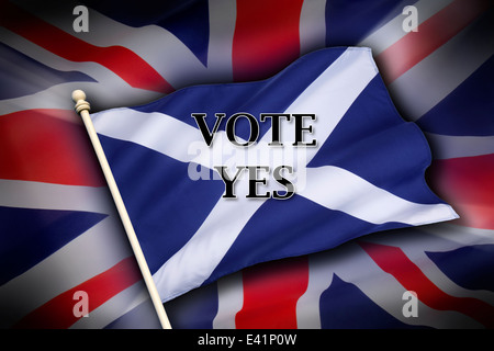 The flag of the United Kingdom (The Union Flag) and the flag of Scotland - Scottish Independence - Vote Yes Stock Photo
