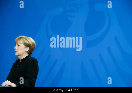 Berlin, Germany. 2nd July, 2014. German Chancellor Angela Merkel attends a press conference after a meeting with NATO Secretary General Anders Fogh Rasmussen at the chancellery in Berlin, Germany, July 2, 2014. Credit:  Zhang Fan/Xinhua/Alamy Live News Stock Photo
