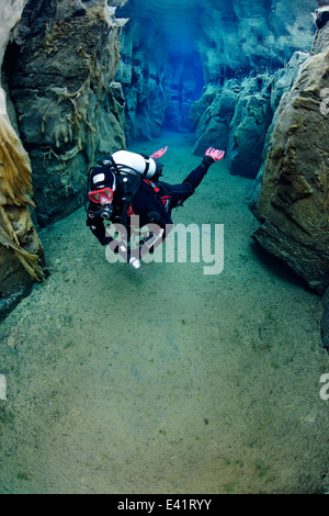 scuba divier in Nesgja, small fissure in the North of Iceland, Nesgja, Akureyri, North Iceland Stock Photo