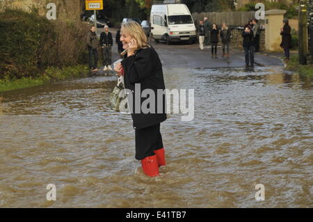 Flooding caused by bad weather conditions that have hit the UK.  Featuring: river stour Where: Blandford Forum, Dorset, United Kingdom When: 24 Dec 2013 Stock Photo