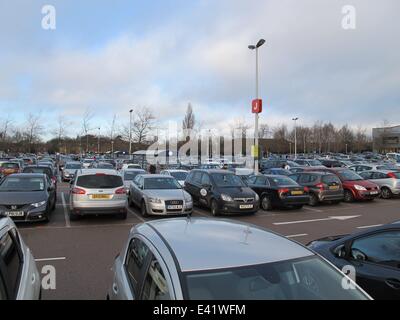 The retail park at London Colney was busy as the Boxing Day sales started. The car park was quickly filled before the shops opened. A nearby Tesco reduced the price of all its' turkeys.  Featuring: London Colney retail park View of car park Where: London, Stock Photo