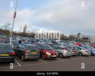 The retail park at London Colney was busy as the Boxing Day sales started. The car park was quickly filled before the shops opened. A nearby Tesco reduced the price of all its' turkeys.  Featuring: London Colney retail park View of car park Where: London, Stock Photo