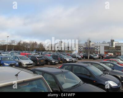 The retail park at London Colney was busy as the Boxing Day sales started. The car park was quickly filled before the shops opened. A nearby Tesco reduced the price of all its' turkeys.  Featuring: London Colney retail park View of car park Where: London, Stock Photo