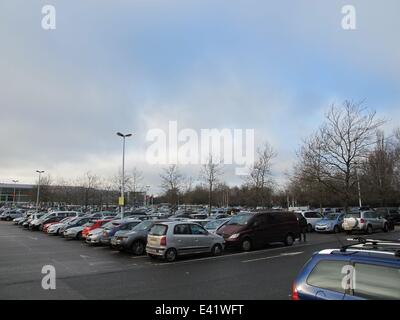 The retail park at London Colney was busy as the Boxing Day sales started. The car park was quickly filled before the shops opened. A nearby Tesco reduced the price of all its' turkeys.  Featuring: London Colney retail park View of car park Where: London, Stock Photo