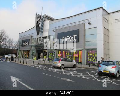 The retail park at London Colney was busy as the Boxing Day sales started. The car park was quickly filled before the shops opened. A nearby Tesco reduced the price of all its' turkeys.  Featuring: London Colney retail park Next Where: London, United King Stock Photo