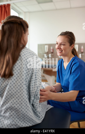 Nurse talking to patient Stock Photo