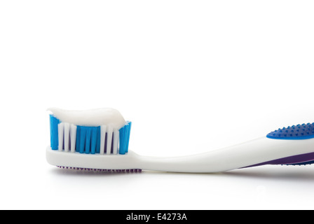 toothbrush with toothpaste on white with clipping path Stock Photo