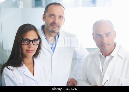 Doctors posing for camera Stock Photo