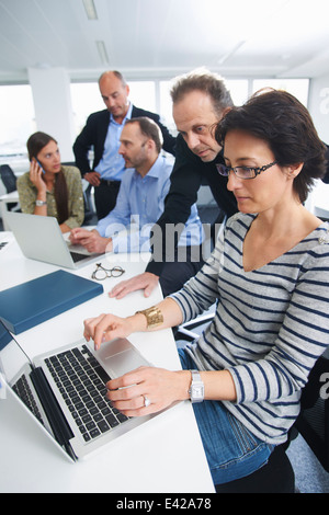 Businesspeople in brainstorming meeting Stock Photo