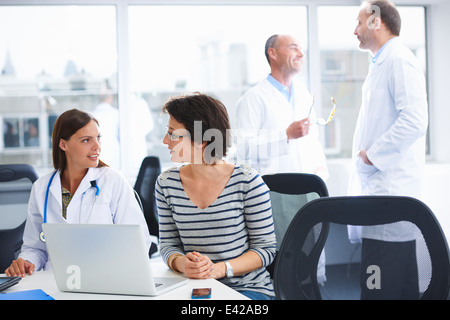 Doctors in brainstorming meeting Stock Photo