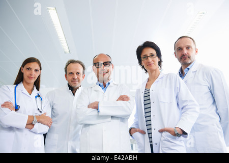 Doctors posing for group portrait Stock Photo