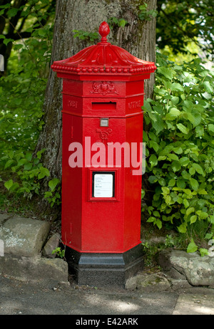 Editorial images of a Victorian style postbox in the Spa town of Buxton located  in the Peak District, Derbyshire Stock Photo