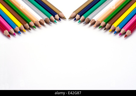 Colored pencils in a line on a white background Stock Photo