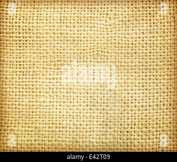 sackcloth textured background abstract yellow textile industry. Stock Photo