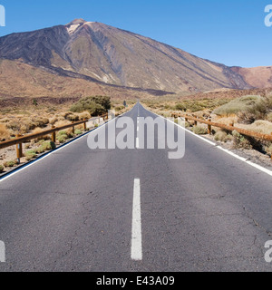 Straight stretch of road through Teide National Park in Tenerife, Canary Islands, Spain. Stock Photo