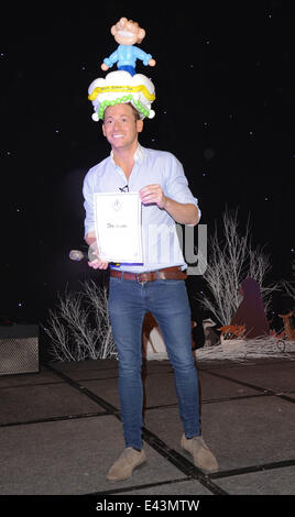 'Mad Hatter's Tea Party'London taxi drivers fund for underprivileged children at Grosvenor House Hotel Park Lane, London  Featuring: Joe Swash Where: London, United Kingdom When: 19 Jan 2014 Stock Photo