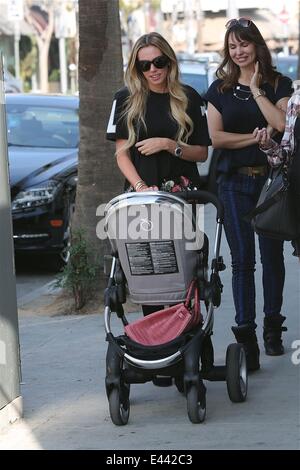 Petra Ecclestone out and about pushing baby daughter Lavinia in her stroller in Beverly Hills  Featuring: Petra Ecclestone Where: Los Angeles, California, United States When: 23 Jan 2014 Stock Photo