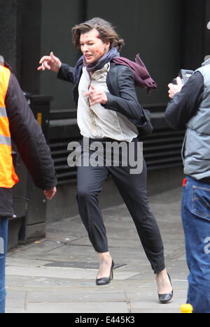 Milla Jovovich on the set of the movie Survivor.  Featuring: Milla Jovovich Where: London, United Kingdom When: 25 Jan 2014 Stock Photo