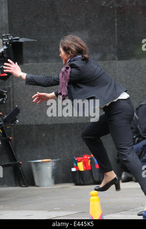 Milla Jovovich on the set of the movie Survivor.  Featuring: Milla Jovovich Where: London, United Kingdom When: 25 Jan 2014 Stock Photo