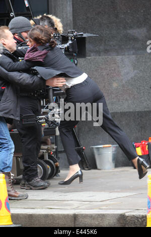 Milla Jovovich on the set of the movie Survivor.  Featuring: Milla Jovovich Where: London, United Kingdom When: 25 Jan 2014 Stock Photo