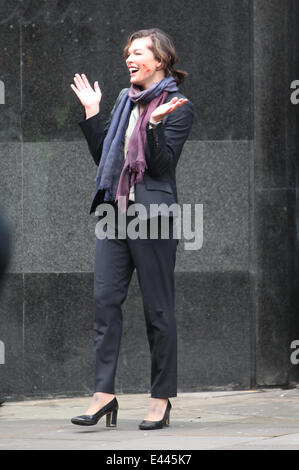 Milla Jovovich on the set of the movie Survivor.  Featuring: Milla Jovovich Where: London, United Kingdom When: 25 Jan 2014 Stock Photo