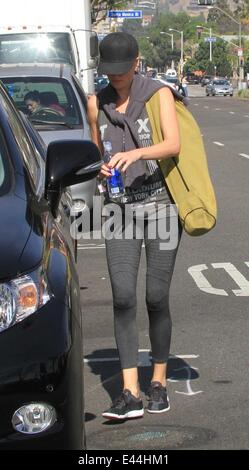 Charlize Theron, wearing no make-up, tries to go undetected as she leaves a yoga class  Featuring: Charlize Theron Where: Los Angeles, California, United States When: 29 Jan 2014 Stock Photo