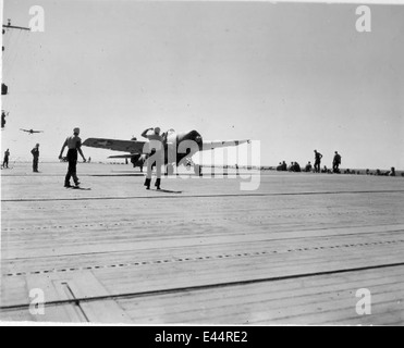A photograph showing flight operations with F4F Wildcat fighters on the aircraft carrier USS Yorktown (CV-4) in 1942, during World War II. Stock Photo