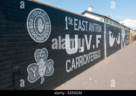 Mural on a wall in Carrickfergus '1st East Antrim UVF, Carrickfergus' Stock Photo