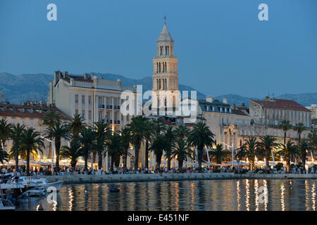 Promenade with the tower of the Cathedral of Saint Domnius, also Saint Dujam or Saint Duje Cathedral, 10th century, at dusk Stock Photo