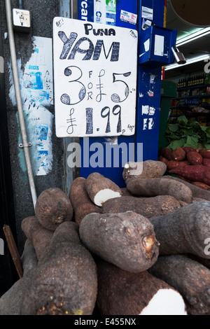 Puna Yams from Ghana for sale at Ridley Road Market in Dalston E8 Hackney East London UK  KATHY DEWITT Stock Photo