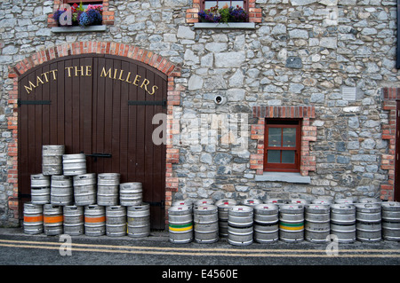 KILKENNY, IRELAND - AUGUST 6, 2012 : lot of kegs in front of the pub Matt the Millers on August 6, 2012 in Kilkenny, Ireland. Stock Photo