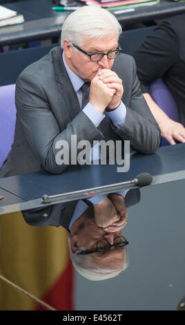 Berlin, Germany. 03rd July, 2014. German Foreign Minister Frank-Walter Steinmeier sits during the debate on minimun wage in the German Bundestag in Berlin, Germany, 03 July 2014. Photo: Hannibal/dpa/Alamy Live News Stock Photo